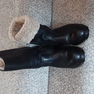 Canadian black leather boots with sheepskin lining.